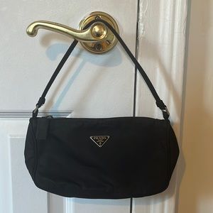 Prada Black Nylon 
mini pochette bag